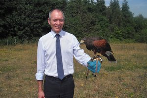 Minister for Culture and Sport, John Griffiths AM with the Harris Hawk